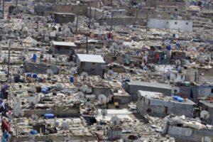 السادات.. يطالب بضرائب ويوم خاص لسكان العشوائيات